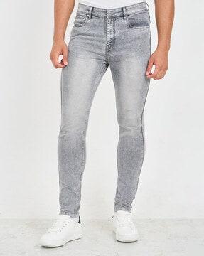 men light washed skinny jeans