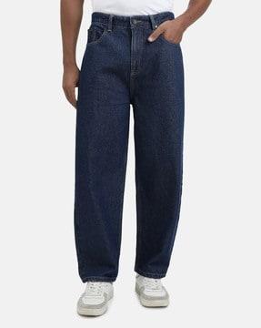 men lightly washed baggy jeans