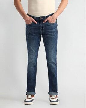 men lightly washed brandon slim tapered fit jeans