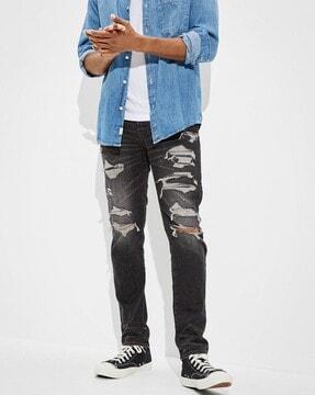 men lightly washed distressed slim fit jeans