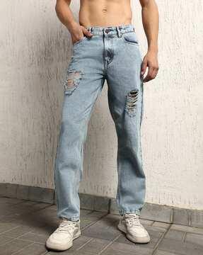 men lightly washed distressed tapered fit jeans