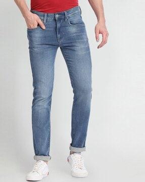 men lightly washed relaxed fit jeans