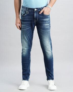 men lightly washed skinny fit jeans