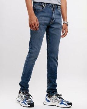 men lightly washed skinny fit jeans