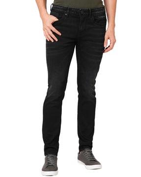 men lightly washed skinny jeans