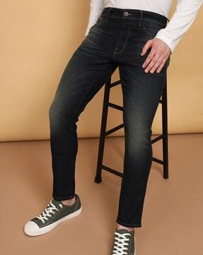 men lightly washed slim fit jeans