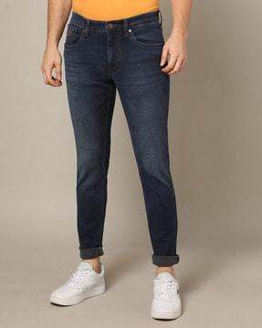 men lightly washed slim tapered fit jeans