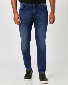 men lightly washed tapered fit jeans