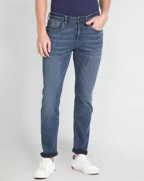 men lightly washed tapered fit jeans