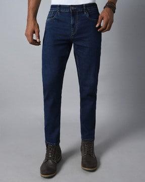 men lightly washed tapered jeans