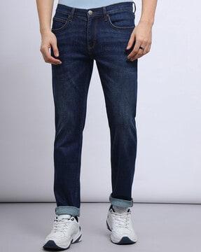 men lightly washed tapered jeans