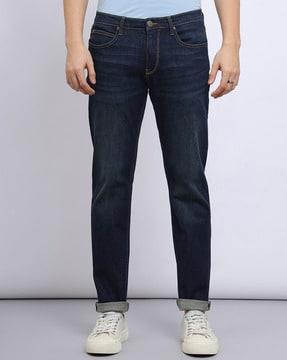 men lightly washed tapered jeans