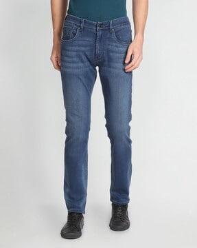 men lightly washed tapered jeans