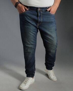 men lightly washed tapered jeans