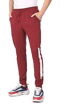 men maroon mid rise solid joggers