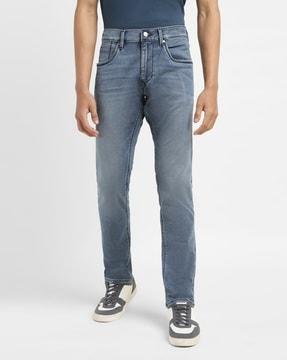 men mid-wash 65504 skinny fit jeans