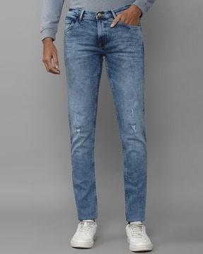 men mid-wash distressed skinny fit jeans