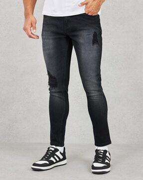 men mid-wash distressed skinny fit jeans