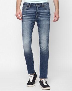 men mid-wash distressed slim fit jeans