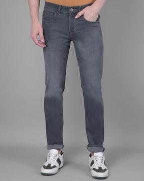 men mid wash slim jeans