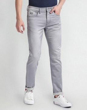 men mid-wash slim tapered jeans