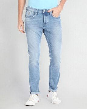 men mid-wash tapered fit jeans
