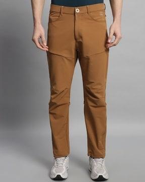 men multi-function nomadic relaxed fit flat-front pants