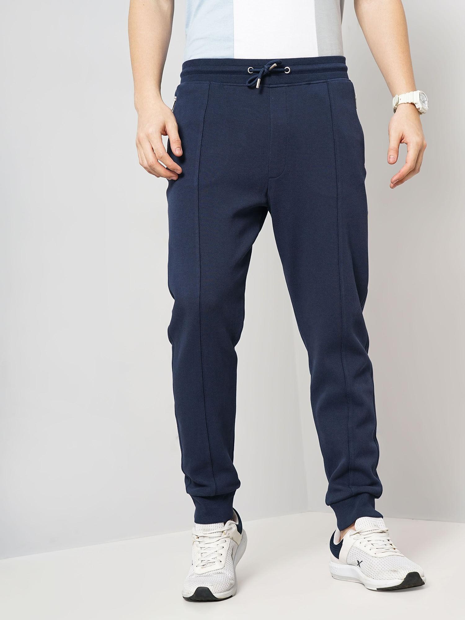 men navy blue solid loose fit cotton pique knitted joggers