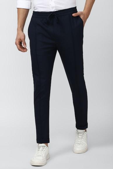 men navy solid carrot fit casual trousers