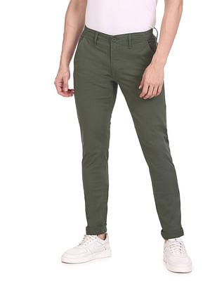 men olive mid rise solid casual trousers