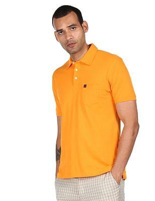 men orange chest pocket solid polo shirt