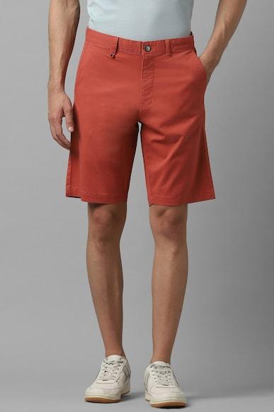 men orange solid slim fit shorts