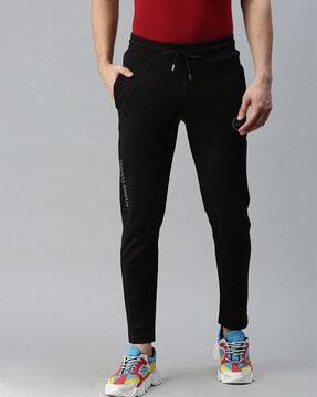 men panelled track pants with insert pockets