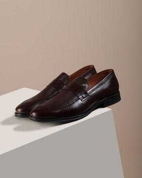 men patterned slip-on shoes