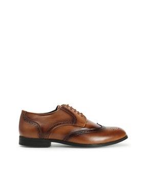 men perforated wing-tip brogues