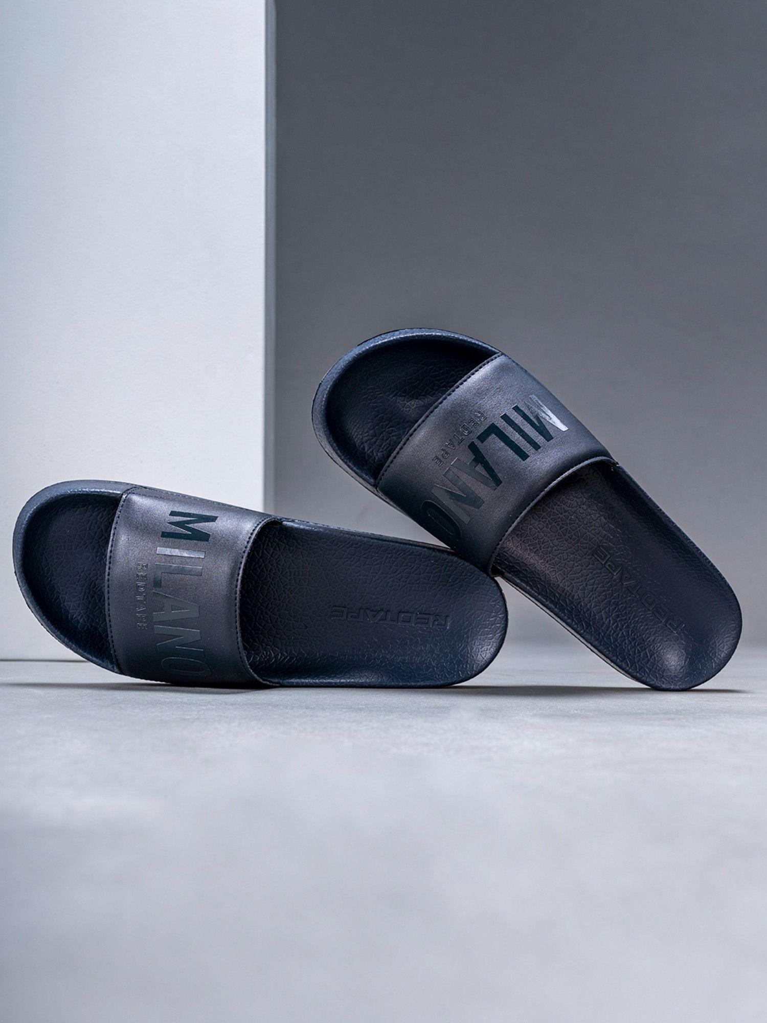 men printed navy sliders