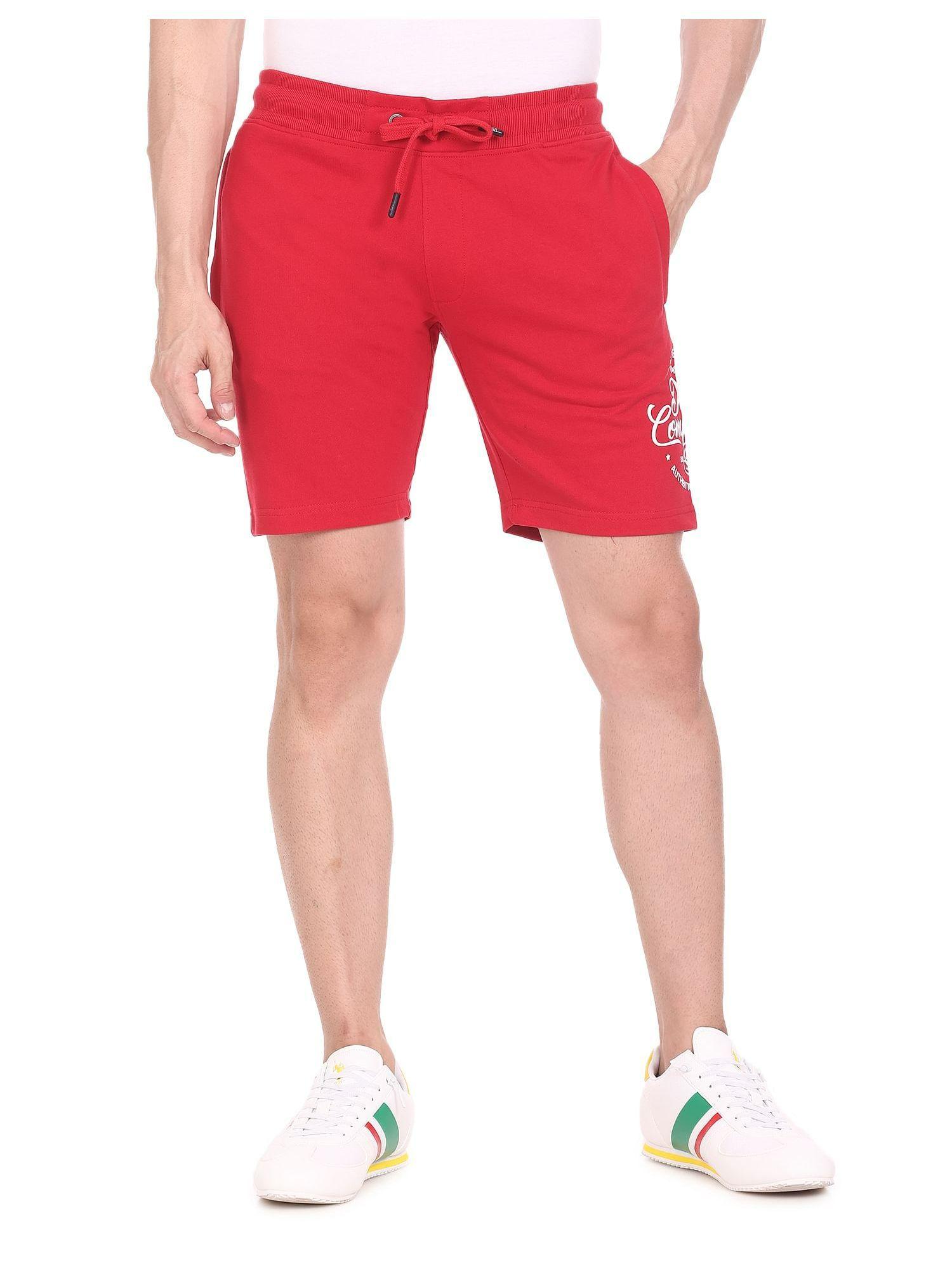 men red mid rise drawstring waist solid shorts
