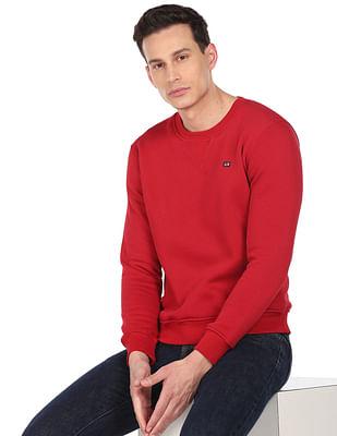 men red solid crew neck sweat shirt