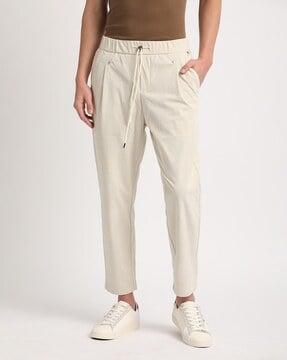 men relaxed fit pleated pants with insert pockets