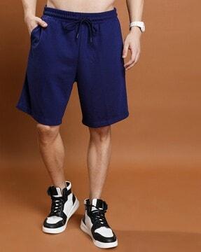 men relaxed fit shorts with insert pockets
