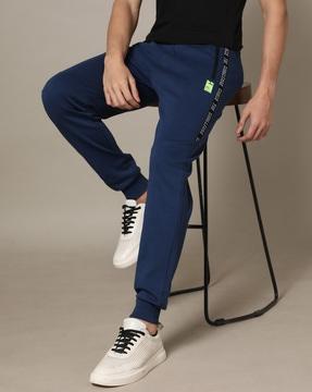 men slim fit joggers with logo tapping