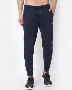 men solid flexi waist track pant