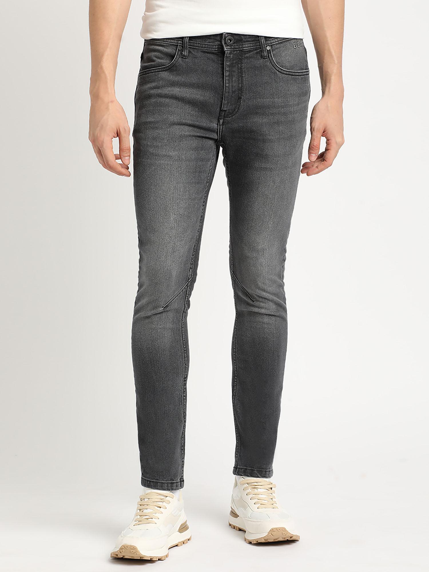 men solid mid rise skinny fit jeans