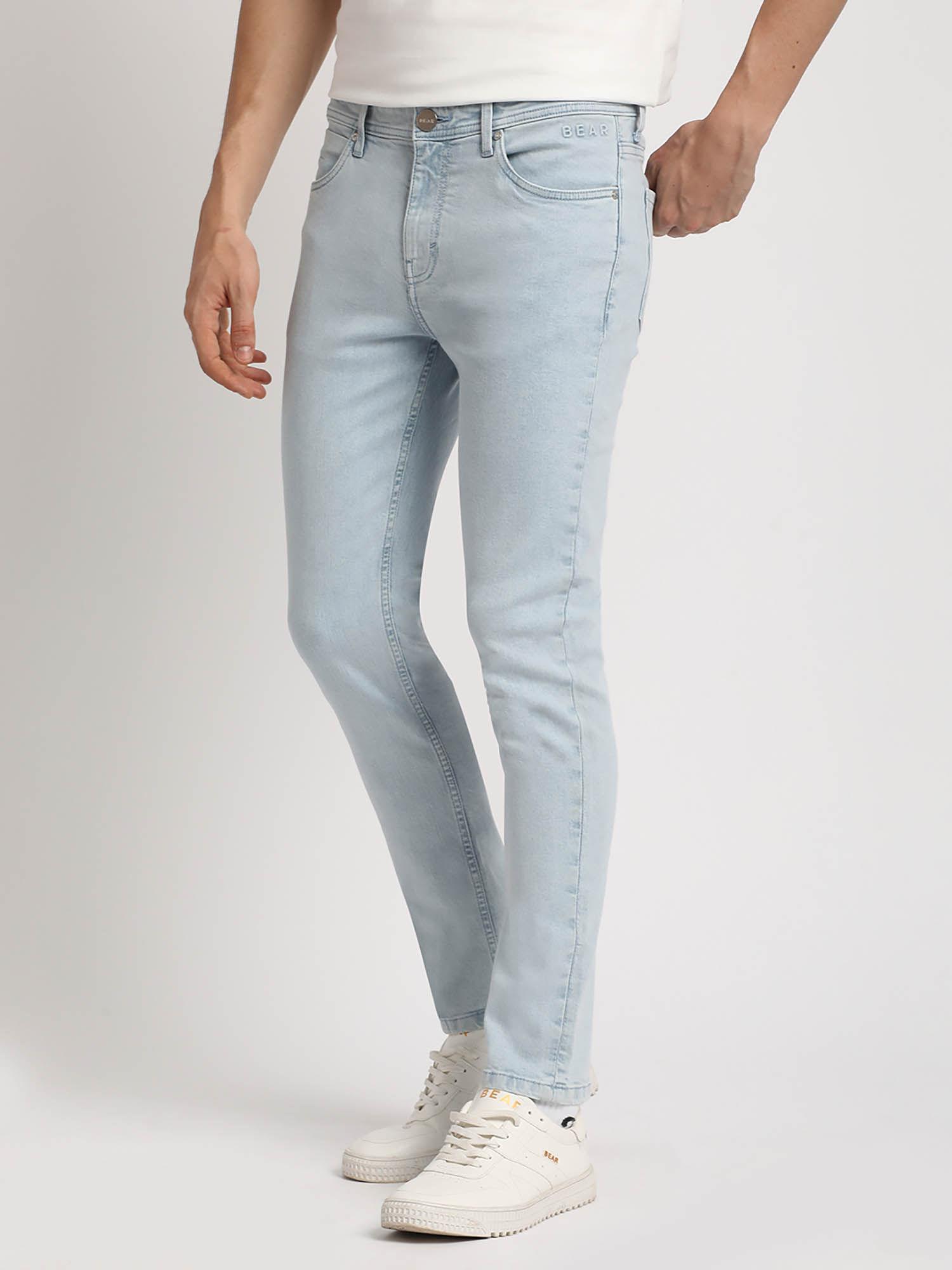 men solid mid rise slim fit jeans