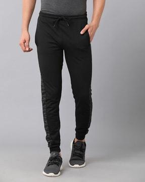 men solid mid-rise track pants