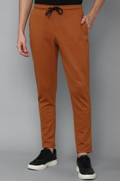 men solid regular fit orange track pants