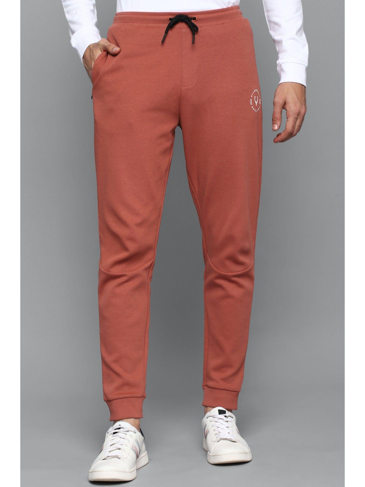 men solid regular fit peach jogger pants