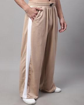 men striped flared track pants