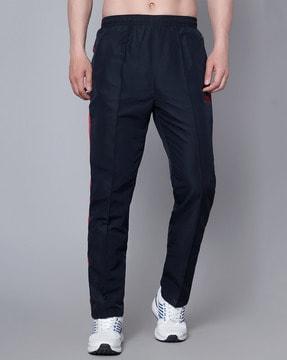 men striped straight track pants with insert pockets