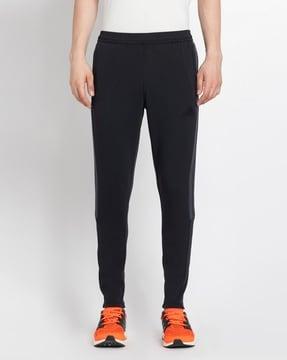 men tiro straight sports track pants